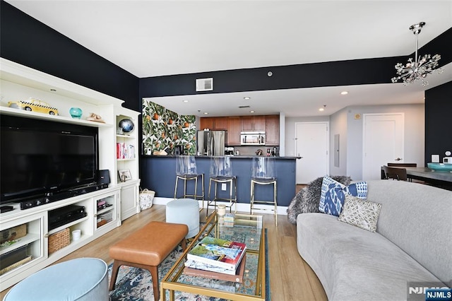 800 Jackson St Unit 505, Hoboken, NJ 07030 - living room with light wood-style floors and recessed lighting
