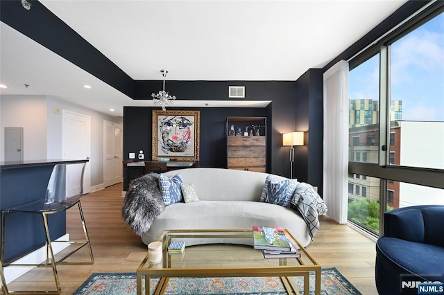 800 Jackson St Unit 505, Hoboken, NJ 07030 - living area featuring light wood-type flooring, recessed lighting, a chandelier, and baseboards