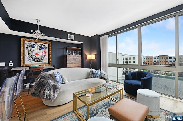 800 Jackson St Unit 505, Hoboken, NJ 07030 - living area featuring wood finished floors and plenty of natural light