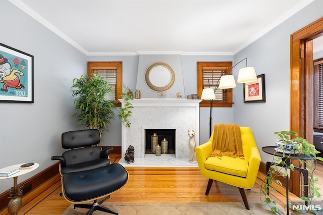 206 Eastern Way, Rutherford, NJ 07070 - sitting room with wood finished floors, ornamental molding, a fireplace, and healthy amount of natural light