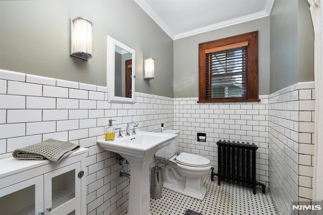 206 Eastern Way, Rutherford, NJ 07070 - half bathroom featuring radiator heating unit, tile walls, a wainscoted wall, ornamental molding, and tile patterned floors