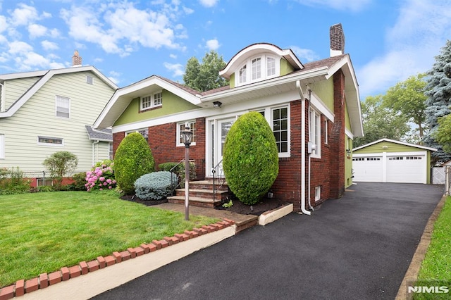 206 Eastern Way, Rutherford, NJ 07070 - view of front of house with a detached garage, an outbuilding, brick siding, a chimney, and a front yard