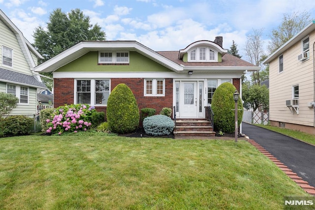 206 Eastern Way, Rutherford, NJ 07070 - view of front of home with brick siding, a front yard, and a chimney