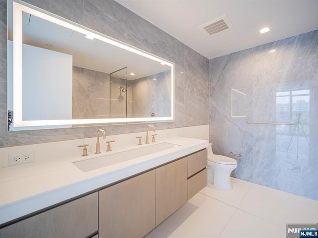320 Adolphus Ave Unit 401, Cliffside Park, NJ 07010 - full bathroom with tile walls, toilet, vanity, a marble finish shower, and tile patterned floors