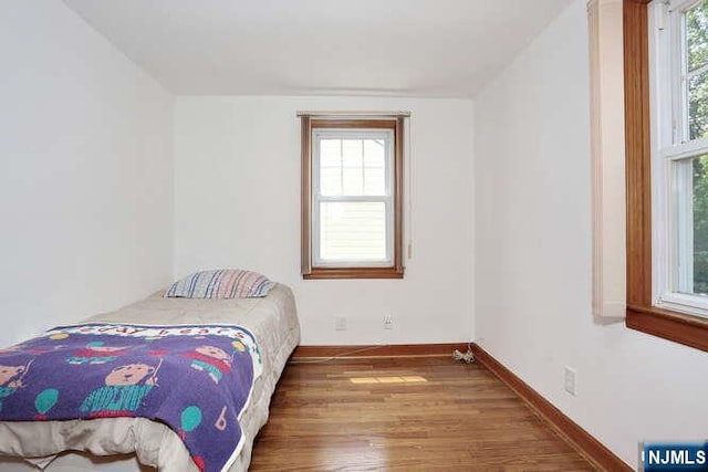 64 Lunn Ave, Bergenfield, NJ 07621 - bedroom featuring wood finished floors and baseboards