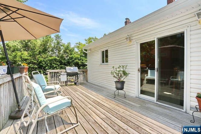 64 Lunn Ave, Bergenfield, NJ 07621 - deck featuring a grill