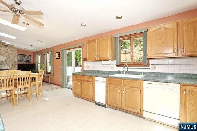 64 Lunn Ave, Bergenfield, NJ 07621 - kitchen with dishwasher, healthy amount of natural light, a ceiling fan, a skylight, and recessed lighting