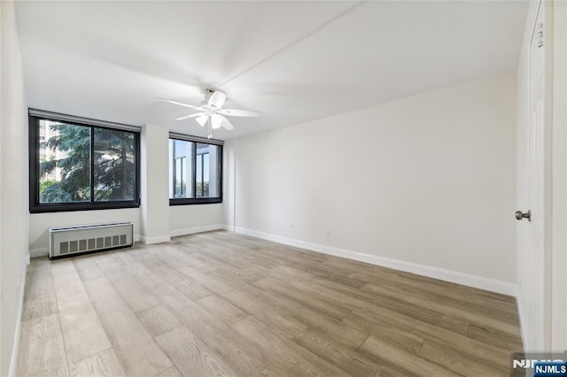 200 Winston Unit 121, Cliffside Park, NJ 07010 - unfurnished room featuring a ceiling fan, light wood-type flooring, and baseboards