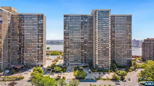 200 Winston Unit 121, Cliffside Park, NJ 07010 - view of building exterior with a water view and a view of city