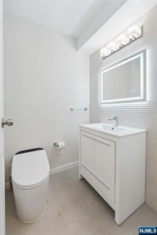 200 Winston Unit 121, Cliffside Park, NJ 07010 - bathroom with vanity, toilet, and tile patterned flooring
