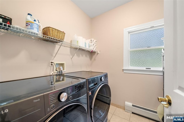 4 Michelle Ct, Harrington Park, NJ 07640 - laundry area featuring baseboard heating, washer and dryer, tile patterned flooring, and baseboards