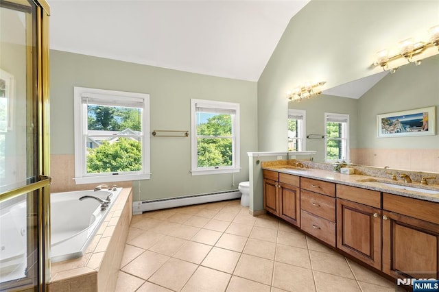 4 Michelle Ct, Harrington Park, NJ 07640 - bathroom with a baseboard heating unit, vaulted ceiling, double vanity, a bath, and toilet