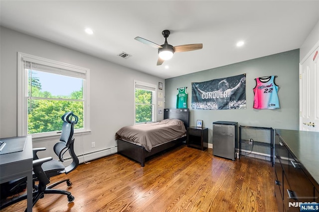 4 Michelle Ct, Harrington Park, NJ 07640 - bedroom with stainless steel fridge, wood finished floors, recessed lighting, an office area, and a ceiling fan