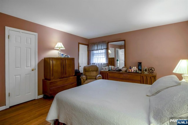 42 Lohs Pl, Harrington Park, NJ 07640 - bedroom with wood finished floors and baseboards