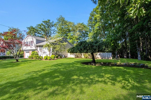 42 Lohs Pl, Harrington Park, NJ 07640 - view of yard featuring a garage
