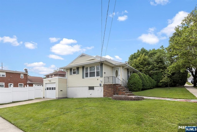 6 Gail Pl, Secaucus, NJ 07094 - view of front of home featuring a garage and concrete driveway