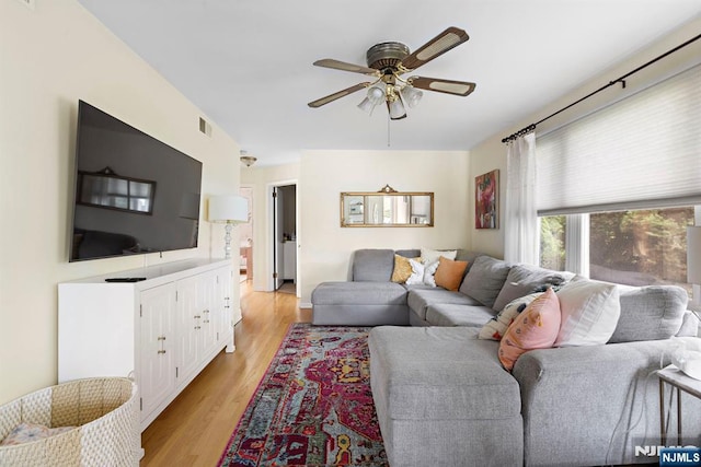 6 Gail Pl, Secaucus, NJ 07094 - living area featuring a ceiling fan and light wood-style flooring