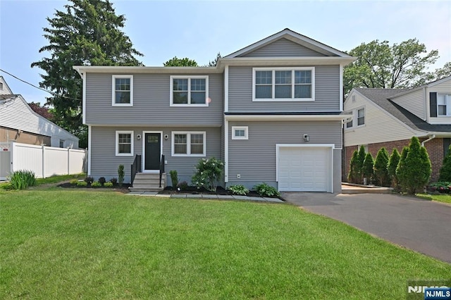 29 Dixon Ave, Dumont, NJ 07628 - view of front of home featuring driveway and an attached garage