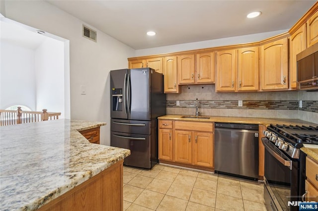 315 Winthrop Dr Unit 3082, Nutley, NJ 07110 - kitchen featuring appliances with stainless steel finishes, a sink, light tile patterned floors, tasteful backsplash, and recessed lighting