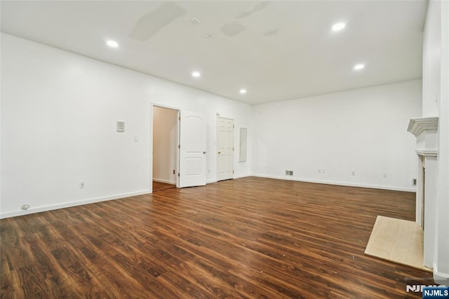 315 Winthrop Dr Unit 3082, Nutley, NJ 07110 - unfurnished living room featuring dark wood-type flooring, recessed lighting, baseboards, and electric panel