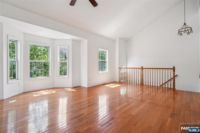 315 Winthrop Dr Unit 3082, Nutley, NJ 07110 - spare room featuring a ceiling fan, lofted ceiling, hardwood / wood-style floors, and baseboards