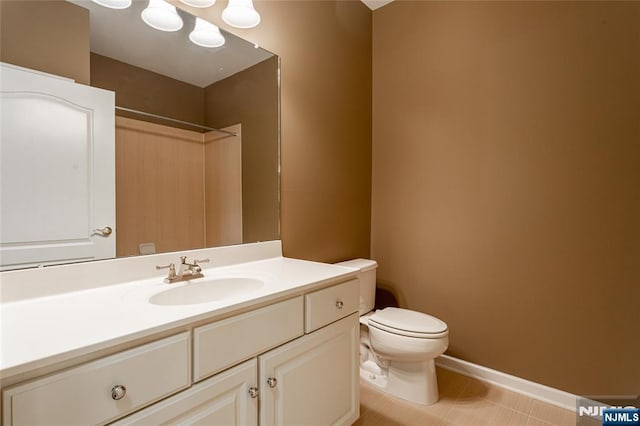 40 Azalea Dr, Old Bridge, NJ 08857 - full bathroom featuring toilet, vanity, a shower, and baseboards