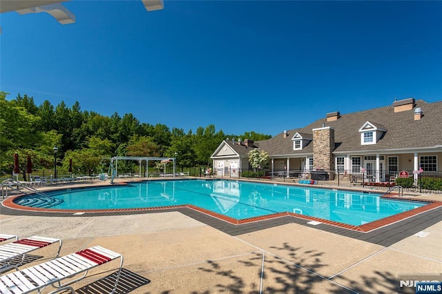 40 Azalea Dr, Old Bridge, NJ 08857 - community pool with a patio area and a sink