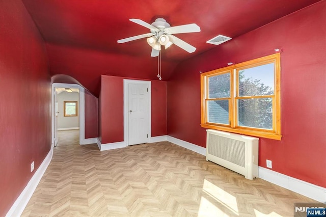 211 Harrison Ave, Hasbrouck Heights, NJ 07604 - bonus room with ceiling fan and radiator heating unit