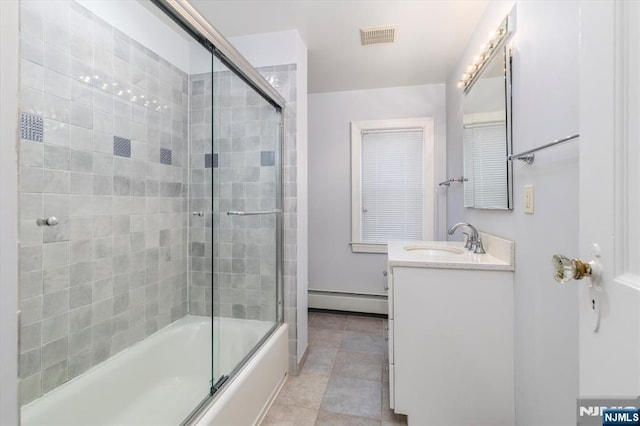 211 Harrison Ave, Hasbrouck Heights, NJ 07604 - full bathroom with baseboard heating, vanity, and shower / bath combination with glass door
