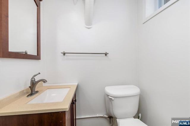 211 Harrison Ave, Hasbrouck Heights, NJ 07604 - bathroom with toilet and vanity