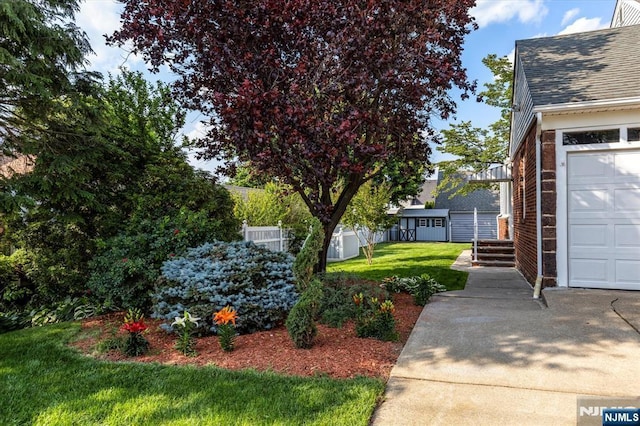 211 Harrison Ave, Hasbrouck Heights, NJ 07604 - view of yard featuring a storage shed