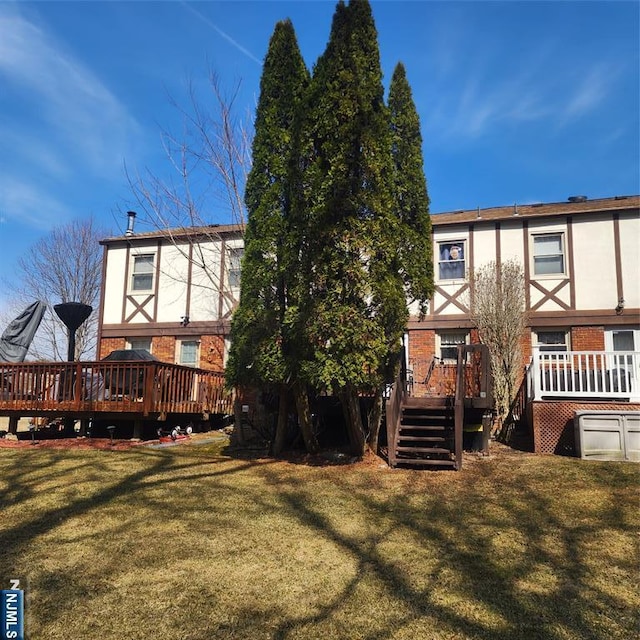 8 Tudor Pl Unit B08, Mount Olive Township, NJ 07828 - back of property with a deck, stairs, and brick siding
