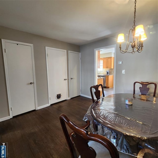 8 Tudor Pl Unit B08, Mount Olive Township, NJ 07828 - dining room featuring a chandelier, wood finished floors, and baseboards