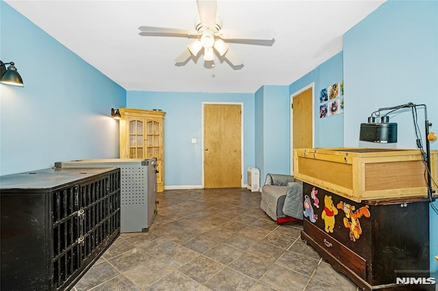 3 High St, Closter, NJ 07624 - living room with a ceiling fan and stone finish flooring