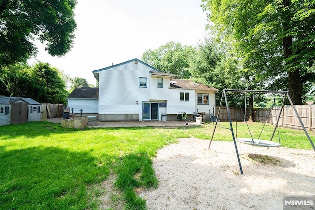 3 High St, Closter, NJ 07624 - rear view of property with a storage shed, a patio area, and a fenced backyard