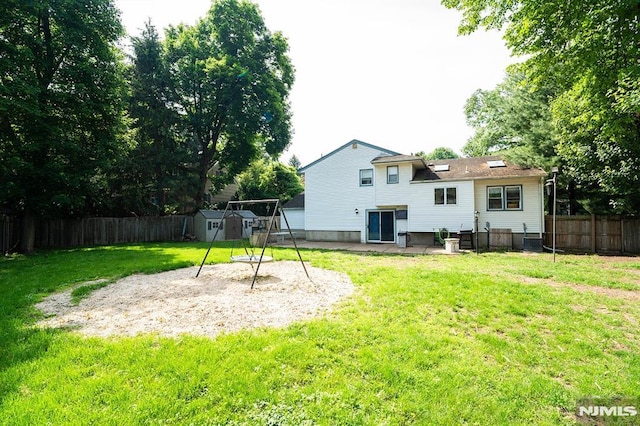 3 High St, Closter, NJ 07624 - back of property featuring a fenced backyard, a shed, and a patio area
