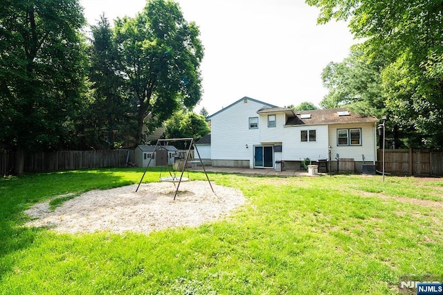 3 High St, Closter, NJ 07624 - back of property featuring a fenced backyard, a shed, and a patio area