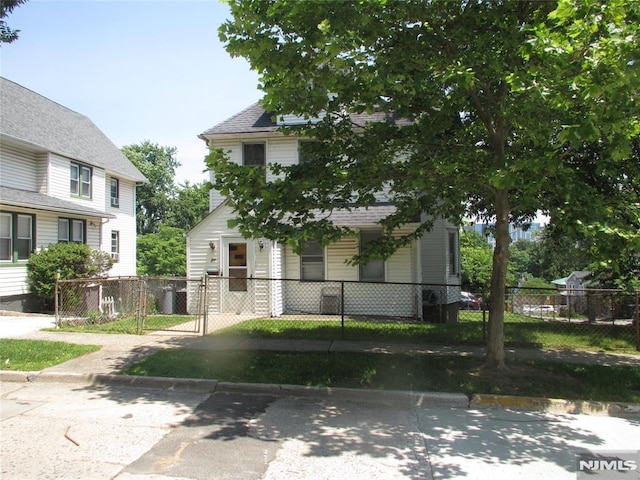 21 Overpeck Ave, Ridgefield Park, NJ 07660 - view of front of property featuring a gate and a fenced front yard