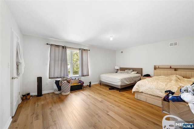 303-305 Runyon St, Newark, NJ 07108 - bedroom with wood finished floors and baseboards