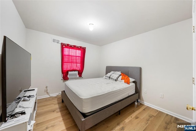 303-305 Runyon St, Newark, NJ 07108 - bedroom with light wood-style flooring, baseboards, and cooling unit