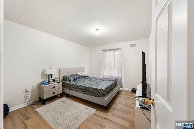 303-305 Runyon St, Newark, NJ 07108 - bedroom featuring light wood finished floors and baseboards
