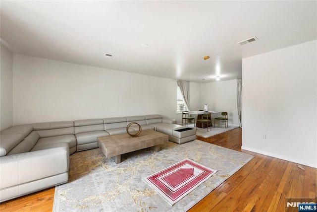 303-305 Runyon St, Newark, NJ 07108 - living area featuring wood-type flooring and baseboards