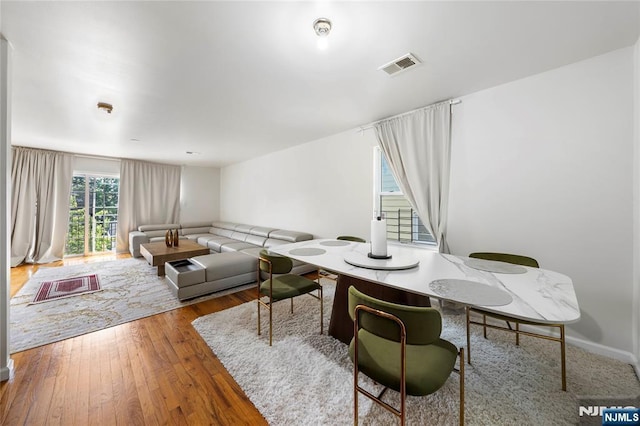 303-305 Runyon St, Newark, NJ 07108 - dining room featuring wood finished floors