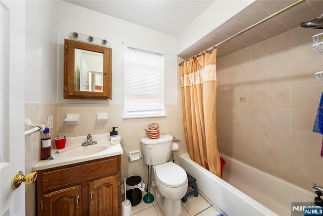 303-305 Runyon St, Newark, NJ 07108 - bathroom featuring vanity, toilet, shower / tub combo with curtain, tile patterned flooring, and a wainscoted wall