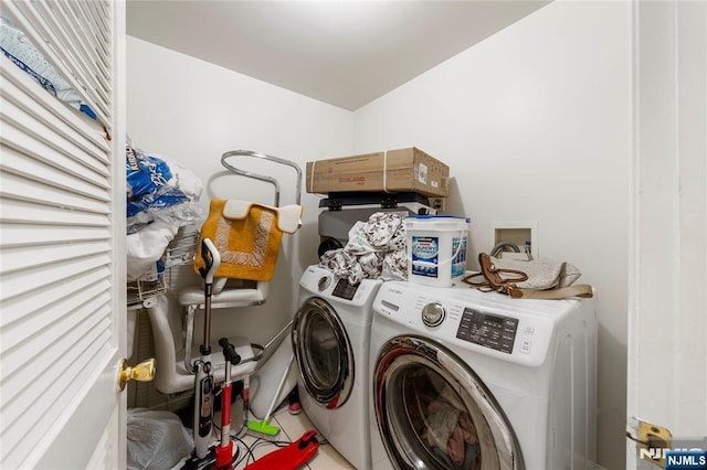 303-305 Runyon St, Newark, NJ 07108 - laundry room with washer and clothes dryer and tile patterned floors