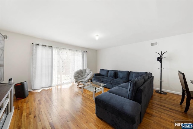 303-305 Runyon St, Newark, NJ 07108 - living room featuring hardwood / wood-style flooring and baseboards