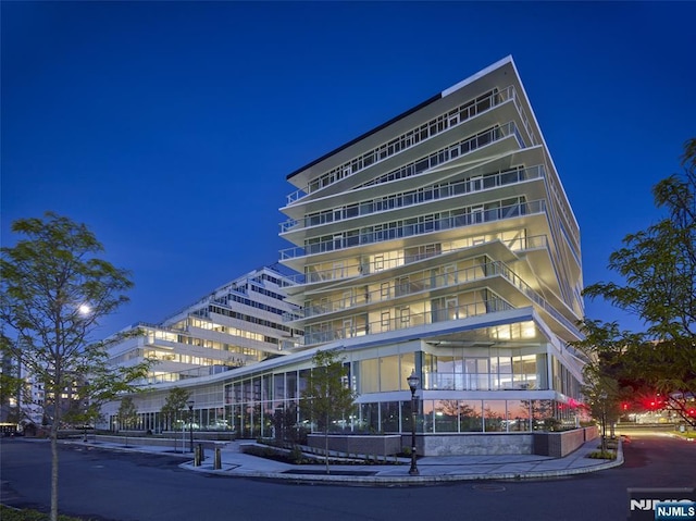 800 Ave At Port Imperial Blvd Unit 517, Weehawken, NJ 07086 - view of property at twilight