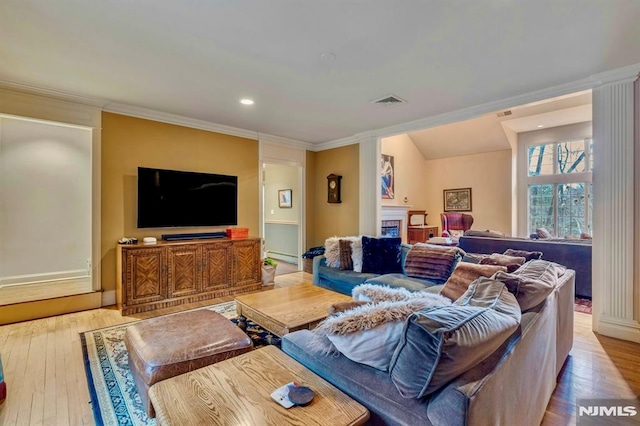 717 Ashmont Rd, Franklin Lakes, NJ 07417 - living room with hardwood / wood-style floors, a baseboard radiator, crown molding, recessed lighting, and a fireplace