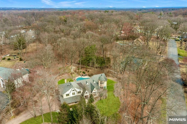 717 Ashmont Rd, Franklin Lakes, NJ 07417 - aerial view of property and surrounding area featuring a forest
