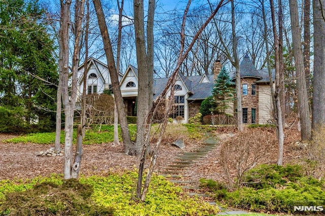 717 Ashmont Rd, Franklin Lakes, NJ 07417 - english style home featuring stone siding and a chimney